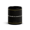 Black 11oz manifestation mug with gold text reading My Reality Bends To Match My Vision - Unbothered Co.