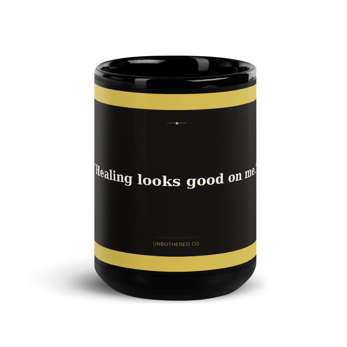 Healing journey affirmation coffee mug in black and gold, close-up